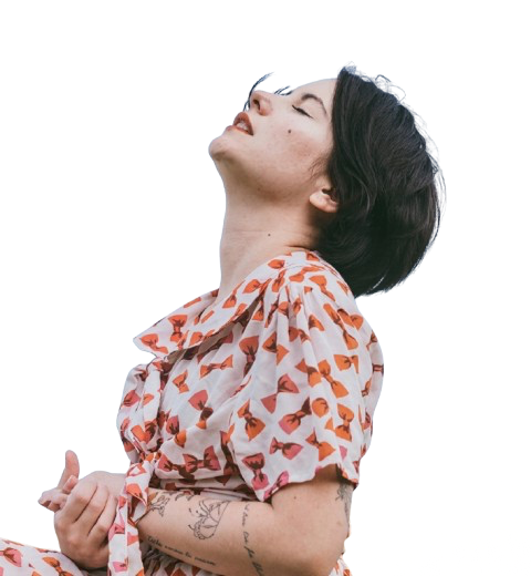 A young woman breathing freely, phone nowhere in sight
