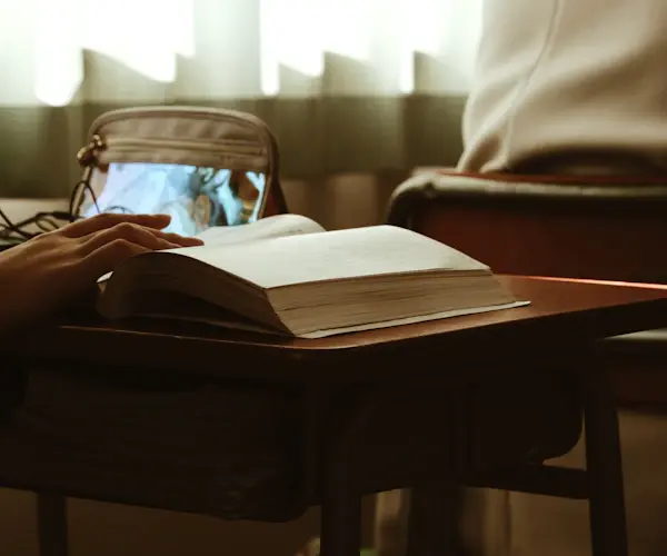 A professional working at a laptop